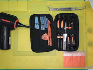 vacume/air blower with muti tools kits for dissassembly of consoles and controllers foam tip qtips on my anti stacic mat.